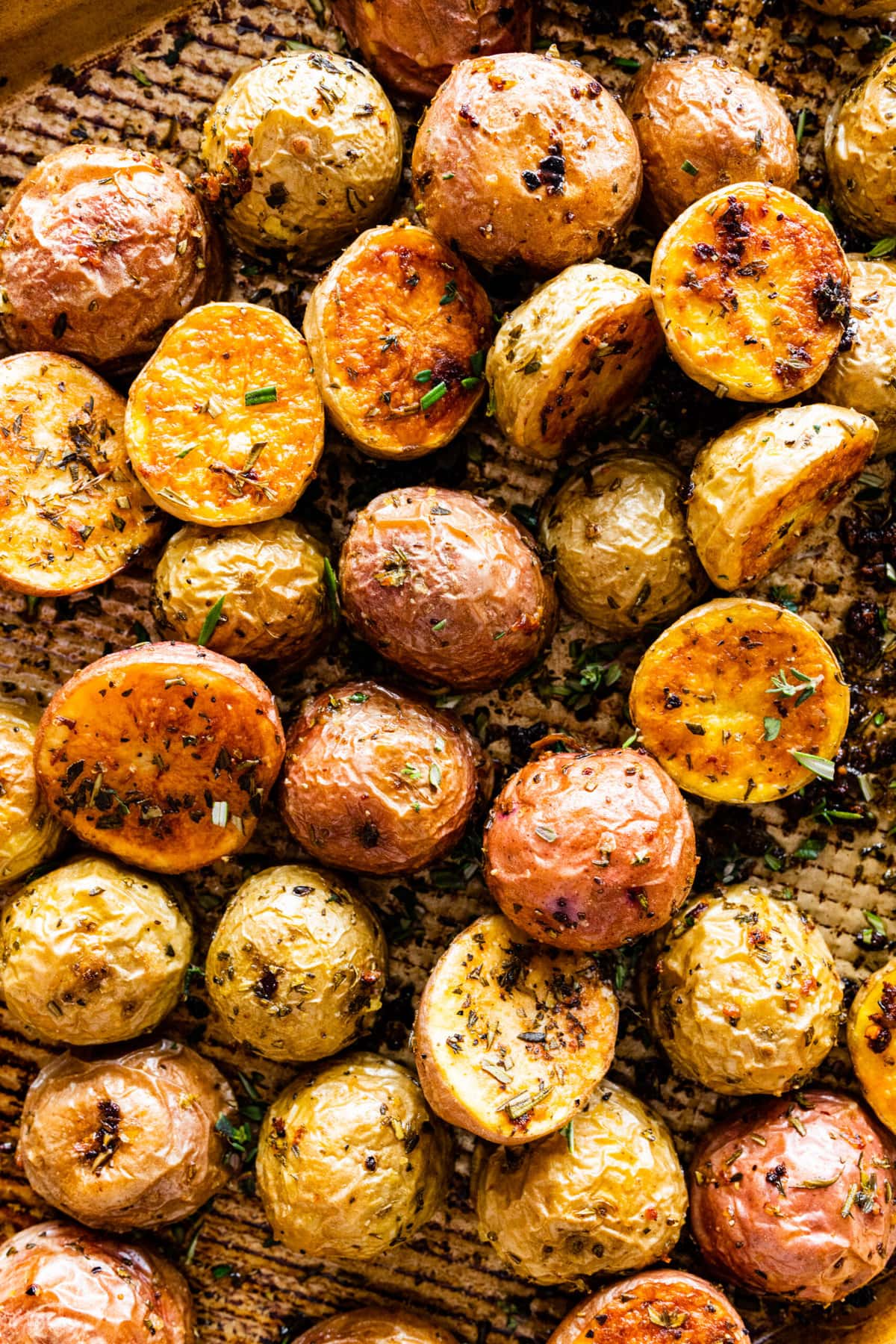 How to make crispy oven roasted potatoes step-by-step instructions: potatoes baked on a sheet pan.